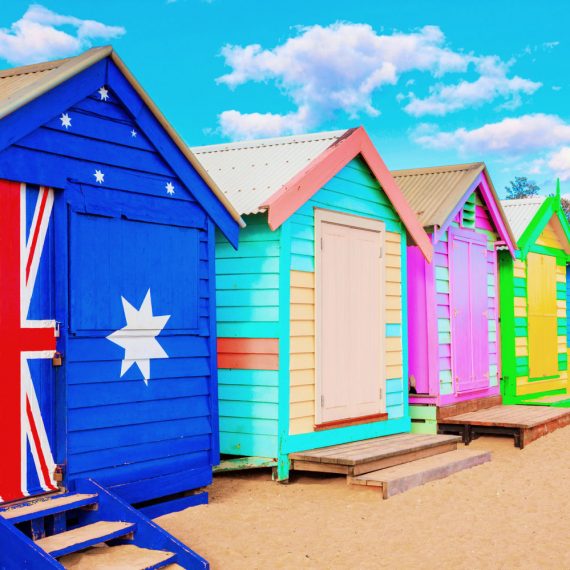 Bathing boxes in a beach against blue sky with copyspace